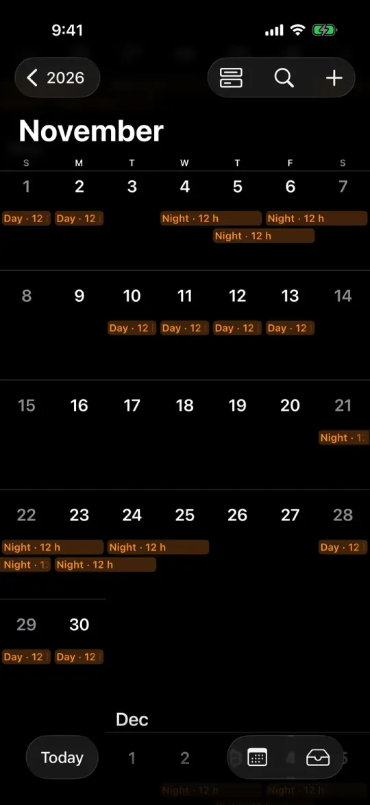 The iPhone Calendar in month view, November 2026, with a DuPont rotation that TurnoRest Pro wrote into it: Day · 12 h on November 1 and 2, Night · 12 h from November 4 to 6, Day · 12 h from November 10 to 13, Night · 12 h from November 21 to 24 and Day · 12 h from November 28 to 30. November 14 to 20, the week off, is empty.